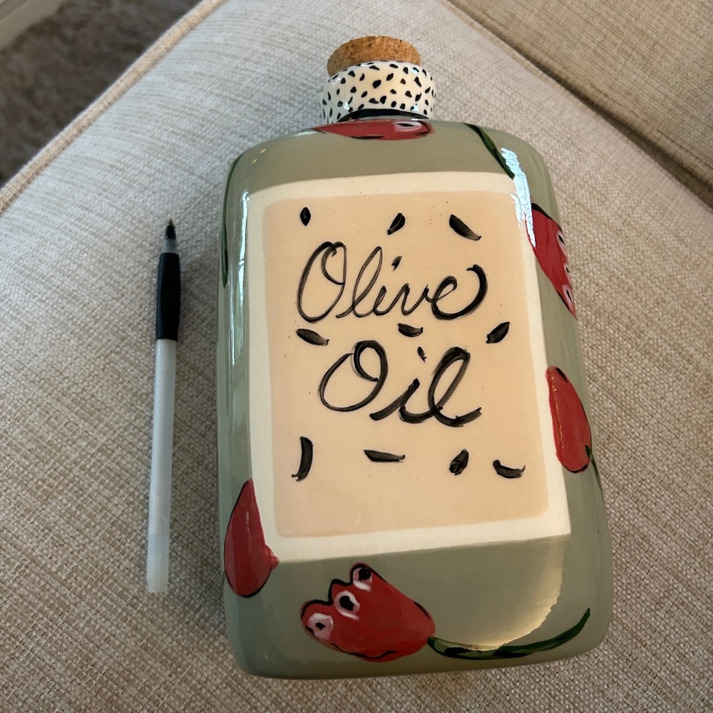 Droll designer pottery oil jar